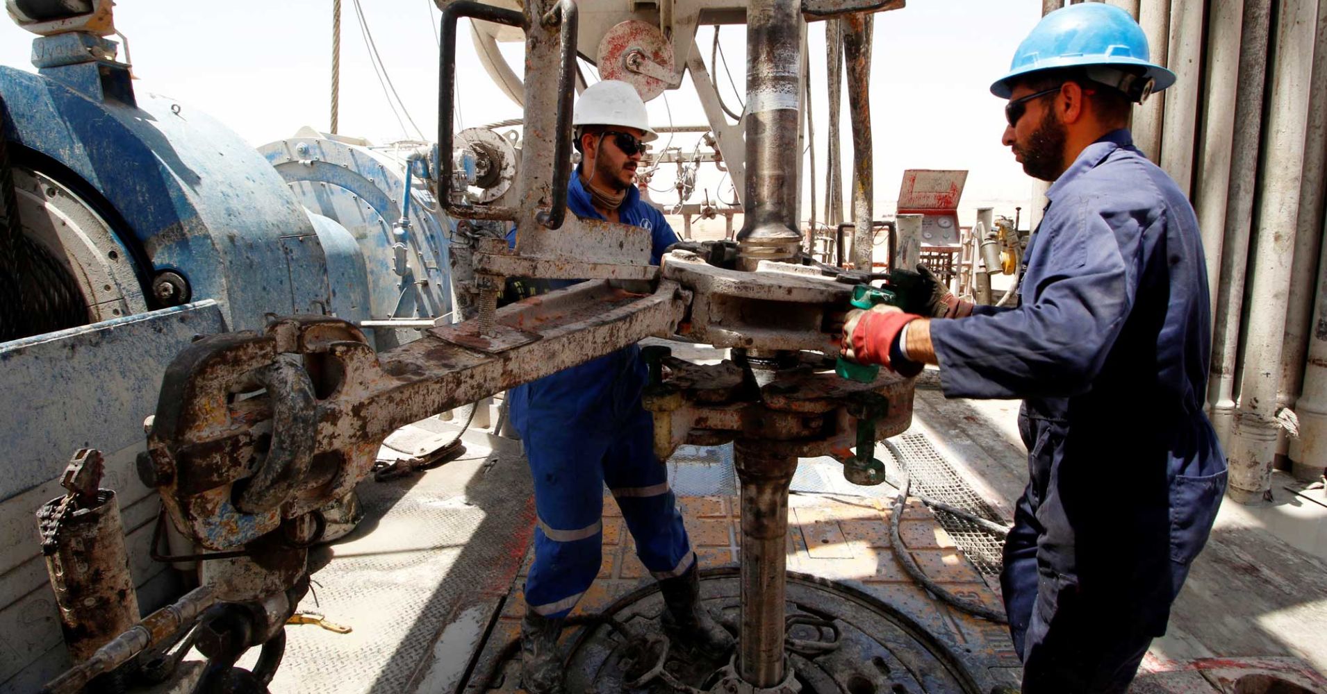 Men work for Iraqi Drilling Company at Rumaila oilfield in Basra, Iraq,