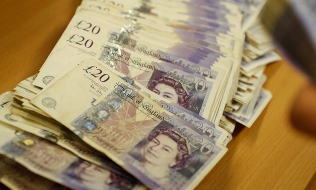 British Pound Sterling banknotes are seen at the Money Service Austria company's headquarters in Vienna, Austria, November 16, 2017. REUTERS/Leonhard Foeger