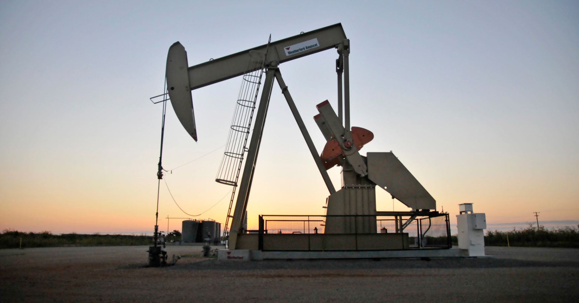 A pump jack operates at a well site leased by Devon Energy Production Co. near Guthrie, Oklahoma.