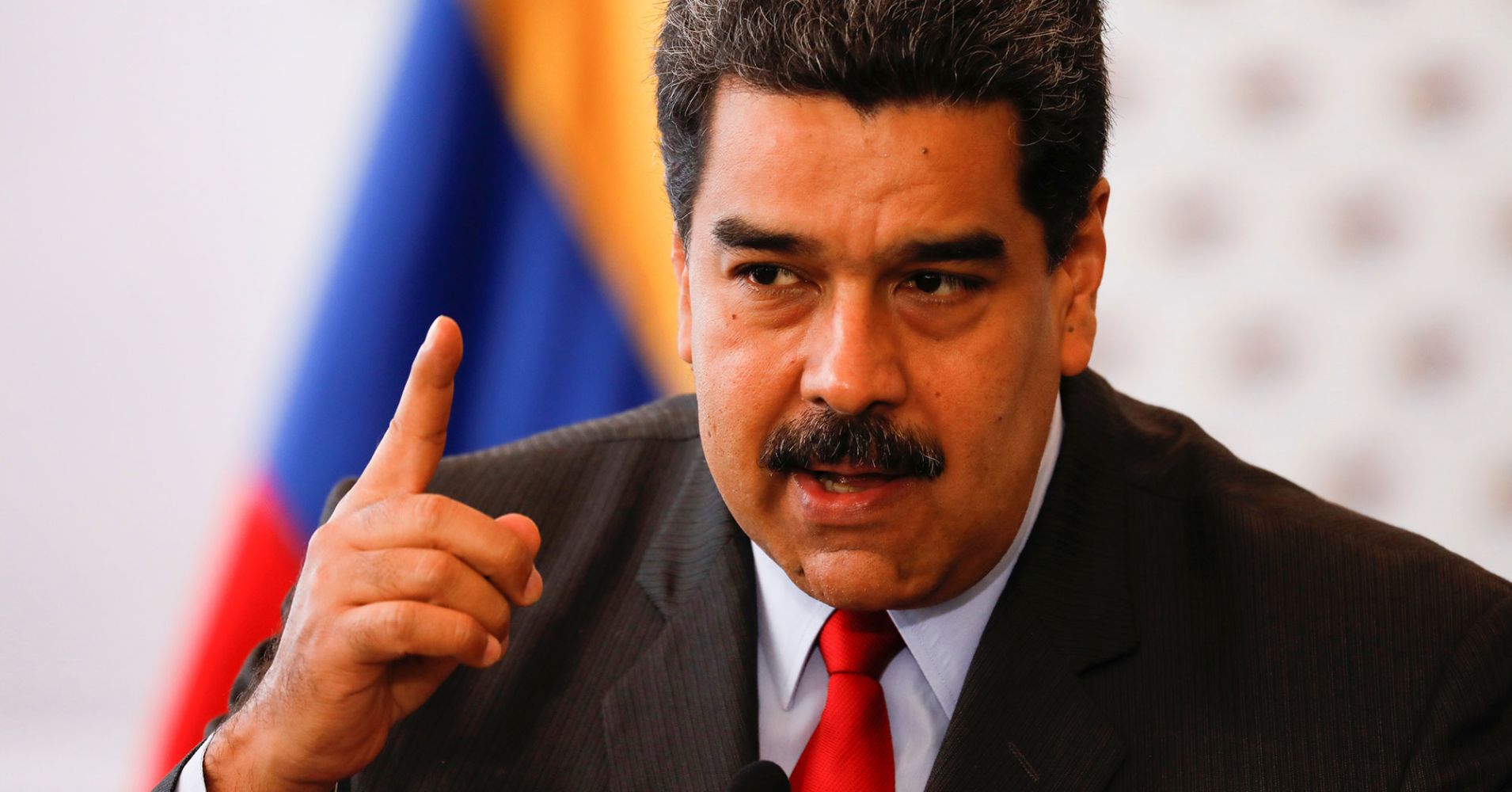 Venezuela's President Nicolas Maduro talks to the media after a meeting for signing an agreement on guarantees for the vote at the National Electoral Council (CNE) headquarters in Caracas, Venezuela March 2, 2018.