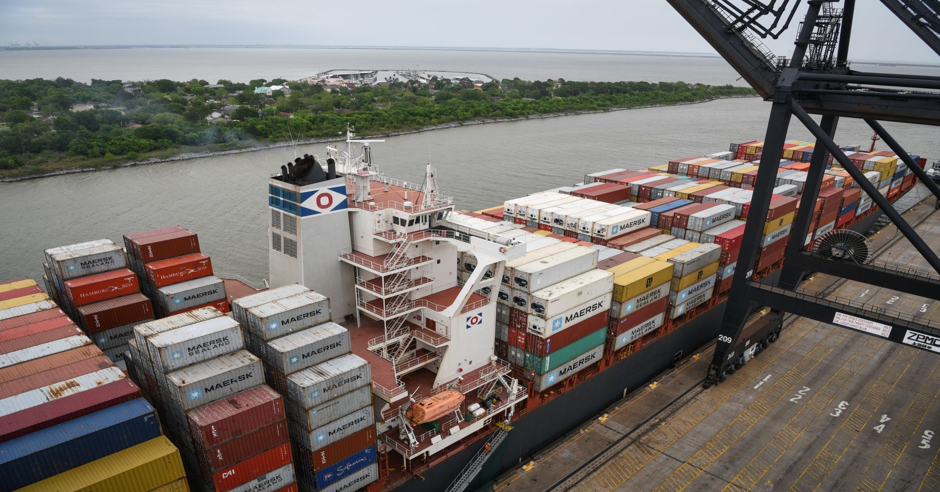 Shipping containers sit stacked on a cargo ship docked at the Port of Houston Bayport Container Terminal in Pasadena, Texas, U.S., on Friday, April 12, 2019.