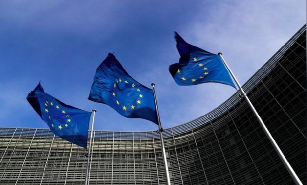 FILE PHOTO: European Union flags flutter outside the EU Commission headquarters in Brussels, Belgium, March 12, 2018. REUTERS/Yves Herman/File Photo